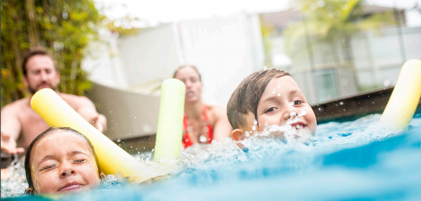 a group of people in a swimming pool